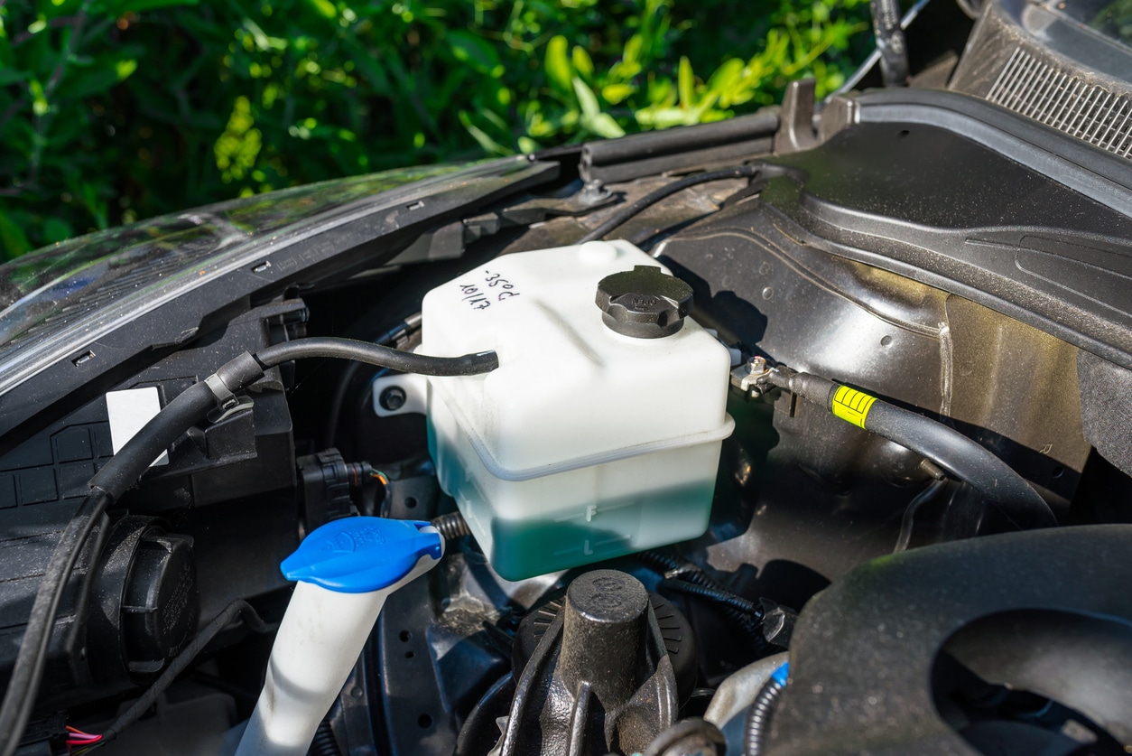New reservoir for cooling liquid inside the engine compartment.